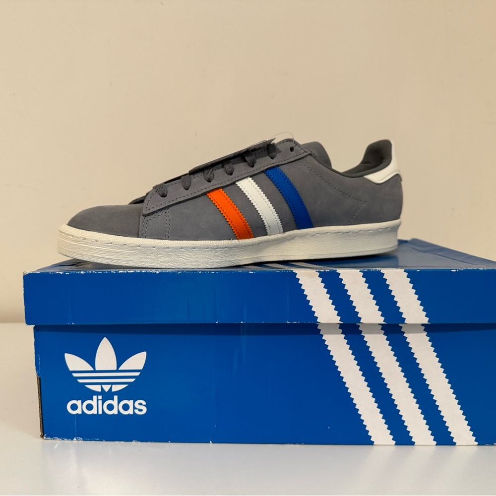 Adidas Men's Gray Sneakers with Blue, White, and Orange Stripes
